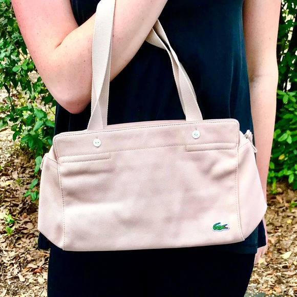 Lacoste Handbags - Lacoste tan nylon handbag